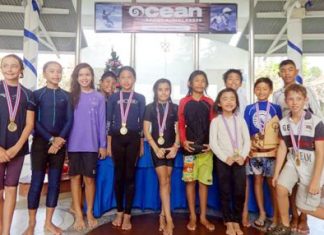 The twelve young sailors pose for a group photo following a weekend’s competitive sailing at Royal Varuna Yacht Club, Dec. 14-15.