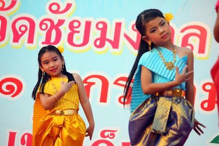 Young dancers from the Wat Chaimongkol Children’s Development Center perform a “Seenuan” dance.