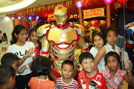 Children are excited to take pictures with their favorite hero, Ironman.