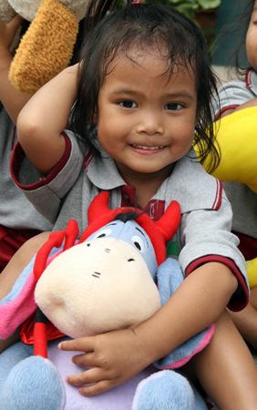 The children from the Father Ray Day Care Center were very happy with their new soft toys.