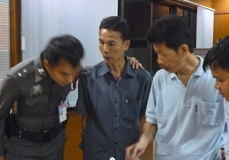 Arnon Udthangkho (center) has been charged with human trafficking, pimping, pandering and separating minors from their parents.