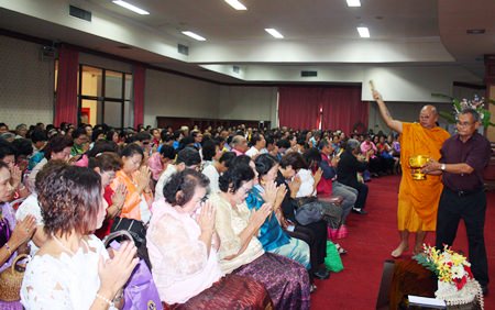 A revered monk blesses the senior citizens for New Year 2014.
