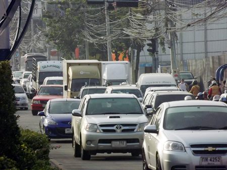 For much of the week-long Pattaya Countdown, Dec. 25 - Jan. 1, arteries from Sukhumvit Highway to Beach Road were packed with cars, taxis, motorbikes, vans and tour buses. Whether driving to the party at Bali Hai Pier, heading north on Second Road or trying to move east or west, traffic crawled, with large buses exacerbating matters, parking wherever they fit or saw fit. The story is nothing new: Each holiday or long weekend brings the same gridlock to Pattaya. Traffic police Maj. Dej Kewtaweewat said traffic is usually bad even on normal days. On holidays, it’s worse. He urged drivers to be patient.