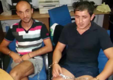 Oleg Sveatobog (left) and Vasile Dodon (right) have been arrested for allegedly using counterfeit electronic cards to rob Pattaya ATMs.