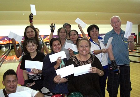 PSC bowlers with their winnings.