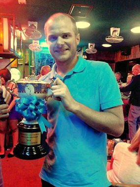 PGS Champion 2014, Chris Smith gets his hands on the trophy at last.