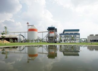 The Mungcharoen Biomass Project in Thailand is a biomass project that uses a rice husk fuelled combustion technique to generate electricity. The electricity generated powers two local rice mills and is also fed into the local power grid. The project converts rice husks, previously considered waste, into a valued commodity while at the same time reducing reliance on the combustion of carbon intensive fossil fuels.