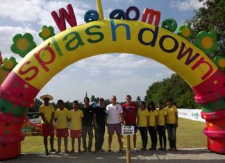 Owner John Wrey (center), Michael French (center, left) and Lee Wrey (center, right), along with park staff welcome everyone to the new Splash Down Water Park Pattaya.