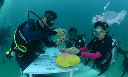Thai-style underwater wedding ceremony