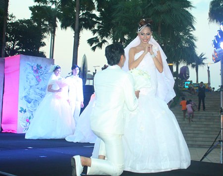 Beautiful models display a Japanese paper wedding dress created by a student from Rajamangala University of Technology in Thanyaburi.