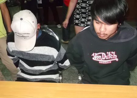 Nopporn Kaewthong (right) and his 15-year-old accomplice (left) have been arrested for theft.