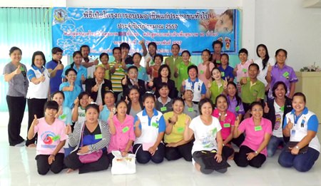 Students, teachers and city officials cheer on the beginning of the new vocational workshop.