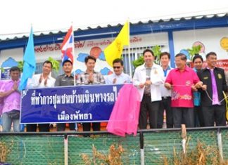 Pattaya officials pull back the curtain to officially open the new center.