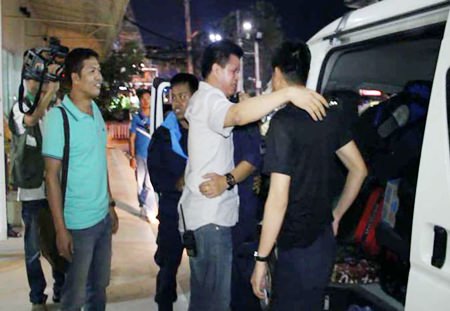 Superintendent Col. Supachai Phuikaewkhum breaks down in tears as he welcomes home local officers who had been deployed to the demonstrations in Bangkok.