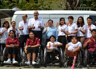 FWD Life Insurance Co. CEO Mike Plaxton (center) led his company to donate 10 wheelchairs to the Redemptorist Vocational School for Persons with Disabilities.