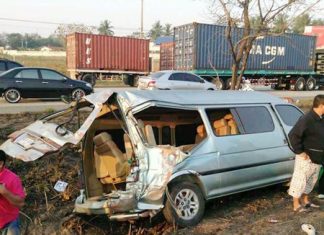 Children on their way to school were injured when a container truck lost its load and crashed into a school bus.