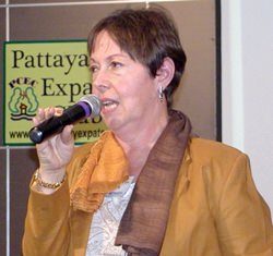 Board member Judith offers tickets in a gift hamper to raise funds for club projects.