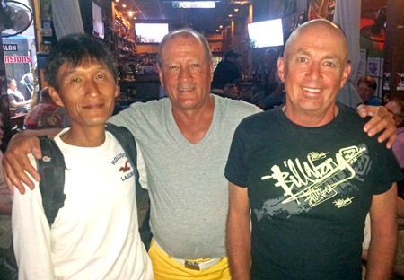 Ken Aihara and Ray Powell celebrate with Golf Captain Phil Smedley.