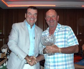 Christy Knight (left) presents the Captain’s winning trophy to JP Maffray.