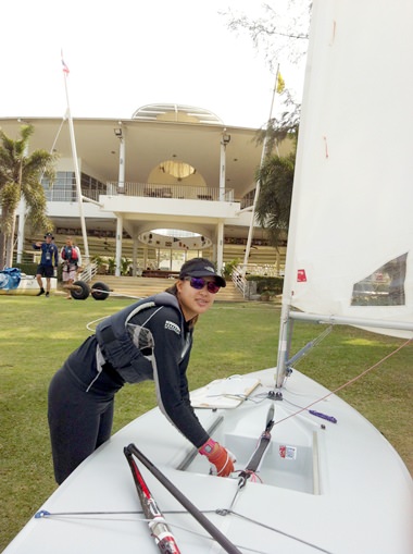 The young aspiring Olympian prepares her laser craft at the Royal Varuna Yacht Club.