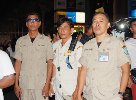 Civil defense officers maintaining peace and order and helping tourists at the event.