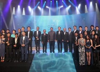 Event VIPs and guests of honor take to the stage with the award winners after the awards ceremony of the 23rd Suppanahongsa Awards at PEACH.