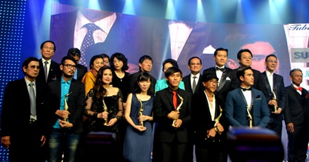 Award winners are brought up on stage.