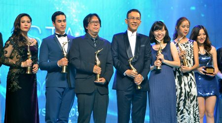 Popular movie directors and actors/actresses pose with their Golden Swan awards.