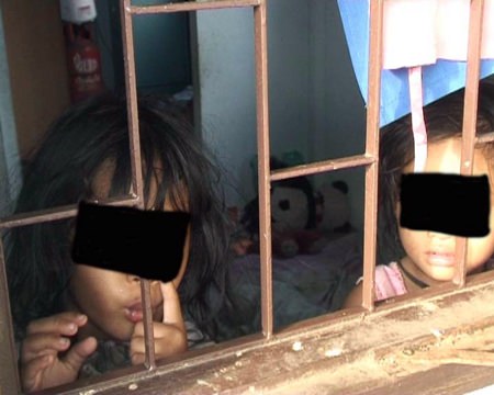 Police found the 2- and 4-year-old girls alone, inside their filthy Sukhumvit Soi 3 home.
