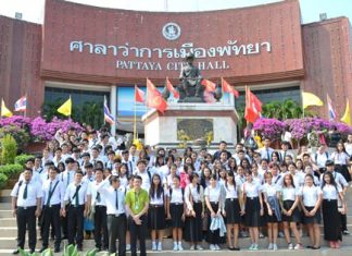 University students from Chachoengsao gather outside Pattaya City Hall for a group photo at the end of their visit.