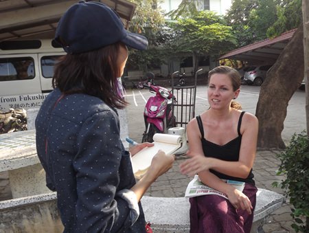 Miss Daria Bredew (right), a German volunteer at the Redemptorist Foundation for people with disabilities, told Pattaya Mail, “…There are too many stray dogs”.
