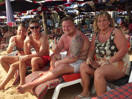 Norwegian tourist Ketil Tellefsen (2nd right) along with his family and friends hope the Bangkok conflict will be resolved soon.