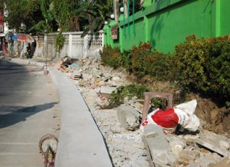 Construction is progressing slowly on a 3 million baht raised wheelchair path near the Redemptorist Vocational School for Persons with Disabilities. The path is critical for wheelchair using residents at the school, for the area can be quite dangerous. City hall says the delay is due to a shortage of construction workers, which, as shown in this photo, means no workers in the middle of the afternoon.