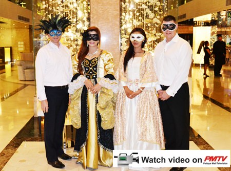 Dominique Ronge (left), General Manager of Centara Grand Phratamnak Resort Pattaya, and Carl Duggan (right), Executive Assistant Manager - Food and Beverage Centara Grand Pratamnak Resort Pattaya, along with 2 members of their staff dress up for the theme of the “Carnevale Di Venezia”.
