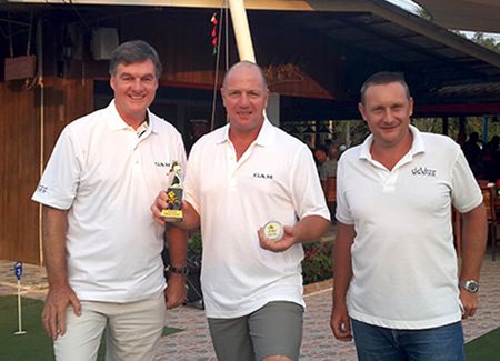 Pete Stonebridge (left) celebrates his hole in one with monthly medal winner Ian Heddle (center) and Geoff Hirst of DeVere.