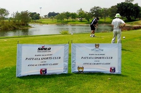 Sponsors banners adorn the first tee.