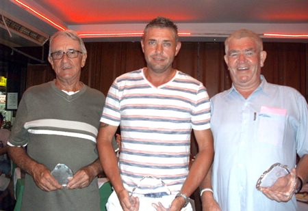 Plate winner Paul Shaw (center) with Bruce Walters and Reg McKay.