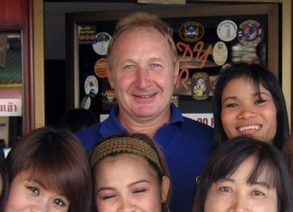 Mickey (center rear) celebrates his win with the staff at the Candy Bar.