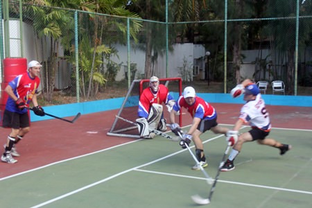 Thai Stix take on the Hong Kong Islanders in the final of the 20th Annual Mekong Cup ball hockey tournament at Centara Karon Resort in Phuket, Saturday, march 15.