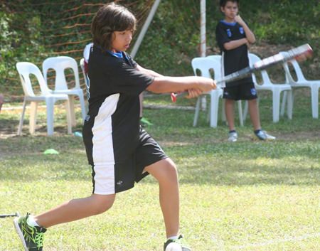 Eric shows focus under pressure in the finals of the softball tournament.