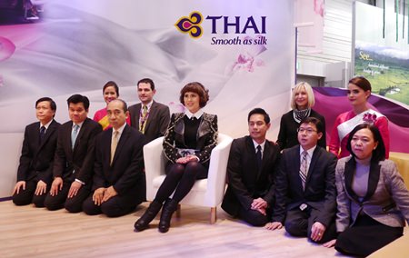 Seated (center): Her Royal Highness Princess Ubolratana Mahidol. Front Row (from right): Soodrak Chanyavongs, Manager of the Promotions Department; Thera Buasri, Airport Service Manager, Frankfurt Airport; Warote Intasara, General Manager, Munich - (from left): Srikit Kattiyakulvanich, Accounting Manager, Germany; Veerayot Purananda, Airport Services Manager, Munich Airport; Pricha Nawongs, Area General Manager, Scandinavia, Finland, Iceland and the Baltic Countries. Second row (from right): Air Hostess; Jutta Yelden, Manager Sales Services, Frankfurt (from left): Air Hostess; Matthias Horn, District Sales Manager, Germany, Austria & Eastern Europe.