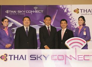 Chokchai Panyayong (center), THAI senior executive vice president of Commercial, and acting president, and Danuj Bunnag (second from left), THAI executive vice president, Products and Customer Services, launched THAI Sky Connect service that provides wireless internet connection (WiFi) on board flights operated with Airbus A330-300 and A380-800 aircraft in all classes of service. Dr. Settapong Malisuwan (second from right), vice chairman of the National Broadcasting and Telecommunications Commission (NBTC), joined the event at THAI’s head office on Vibhavadi Rangsit Road.