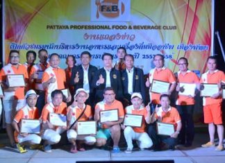 Somkiate Darunaithorn, Resident & Project Manager for Pinnacle Hotels & Resort & Spas (standing, 5th left) and committee members pose for a commemorative photo.