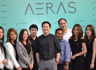 The Urban Property Managing Director Sompop Vanichsenee (center) poses with management colleagues and sales staff at the Aeras Condominium agents’ party held March 28.
