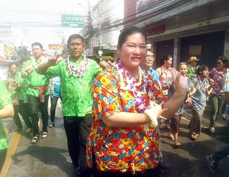 Former Culture Chairperson Sukumol Kunplome dances in the parade.