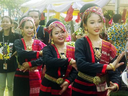 Dancers perform in traditional Thai dress.