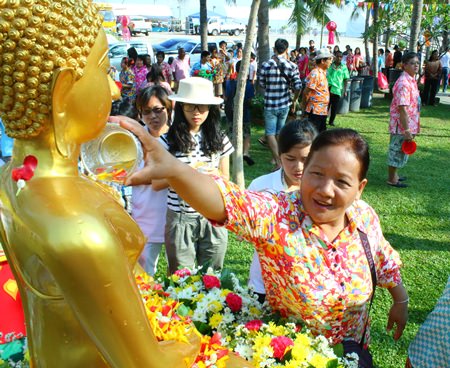 Pattaya citizens pour water on a Lord Buddha image during Naklua’s Wan Lai.