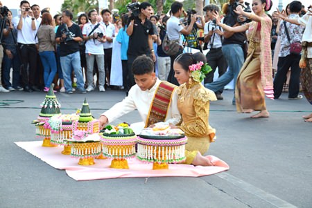 A traditional wedding ceremony broadens the concept of the “Summer of Love” festival.