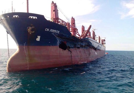 The 165.5-meter CN Jumbos (Above) lists five degrees to starboard as water penetrates three cargo compartments after it collided with the Anton Topic (Below).  No injuries were reported and no oil was spilled, but both vessels were damaged and taken out of service for repairs.