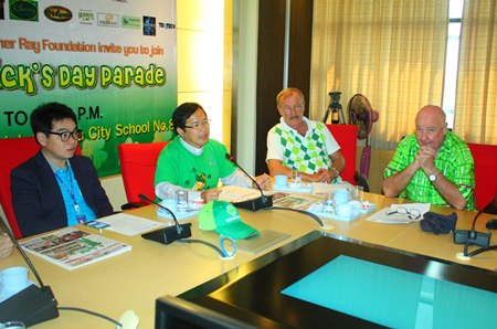 Father Ray Foundation President Rev. Michael Picharn Jaiseri (2nd left) announces that more than 850,000 baht was raised for charity from the St. Patrick’s Day parade in Pattaya.